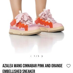 Pink and Orange woman’s sneaker